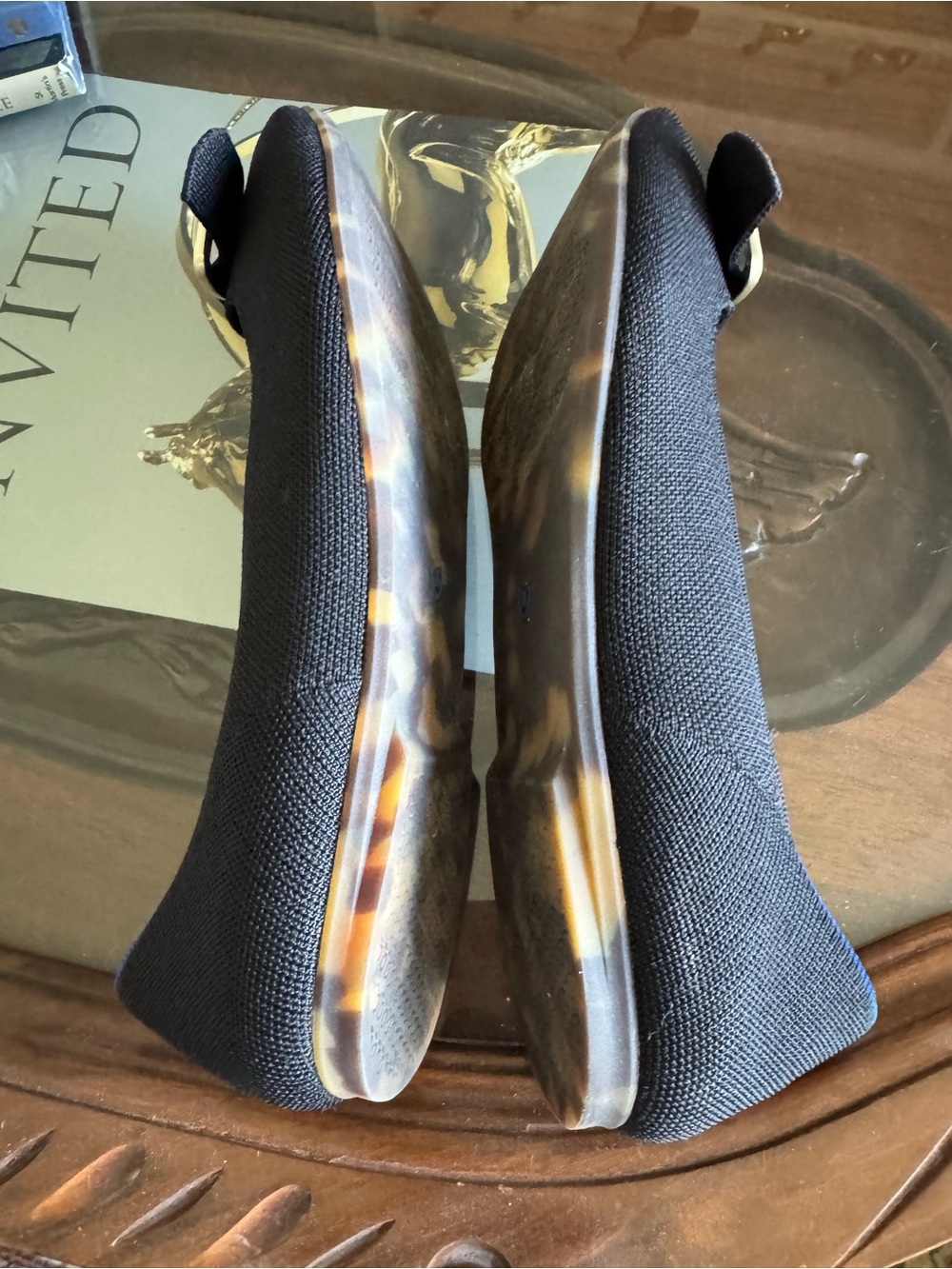 Rothy's Black Pointed-Toe Flats with Brass Buckle and Blue Trim - Picture 6 of 8